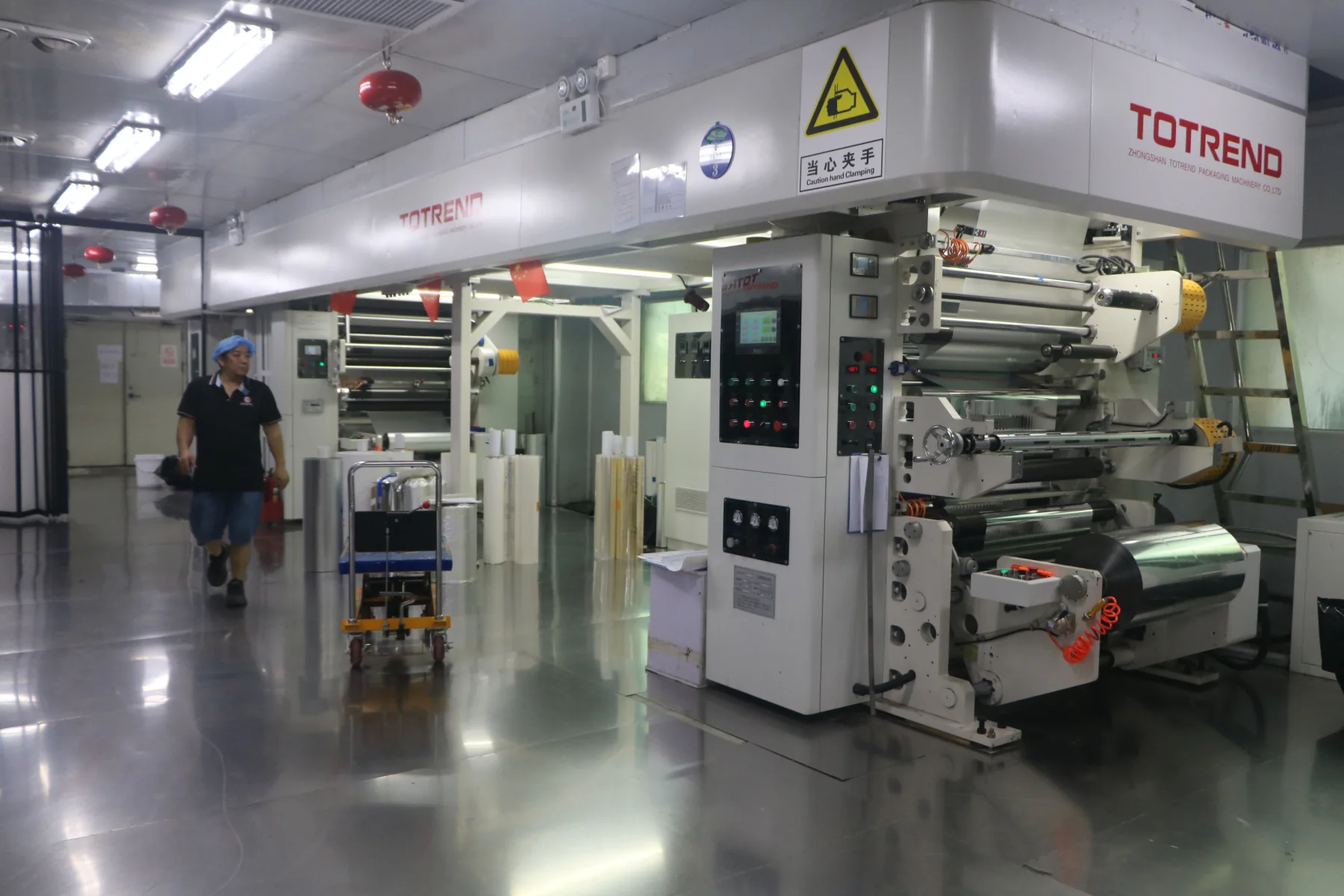 Flexible packaging lamination line in the Unique Packaging workshop